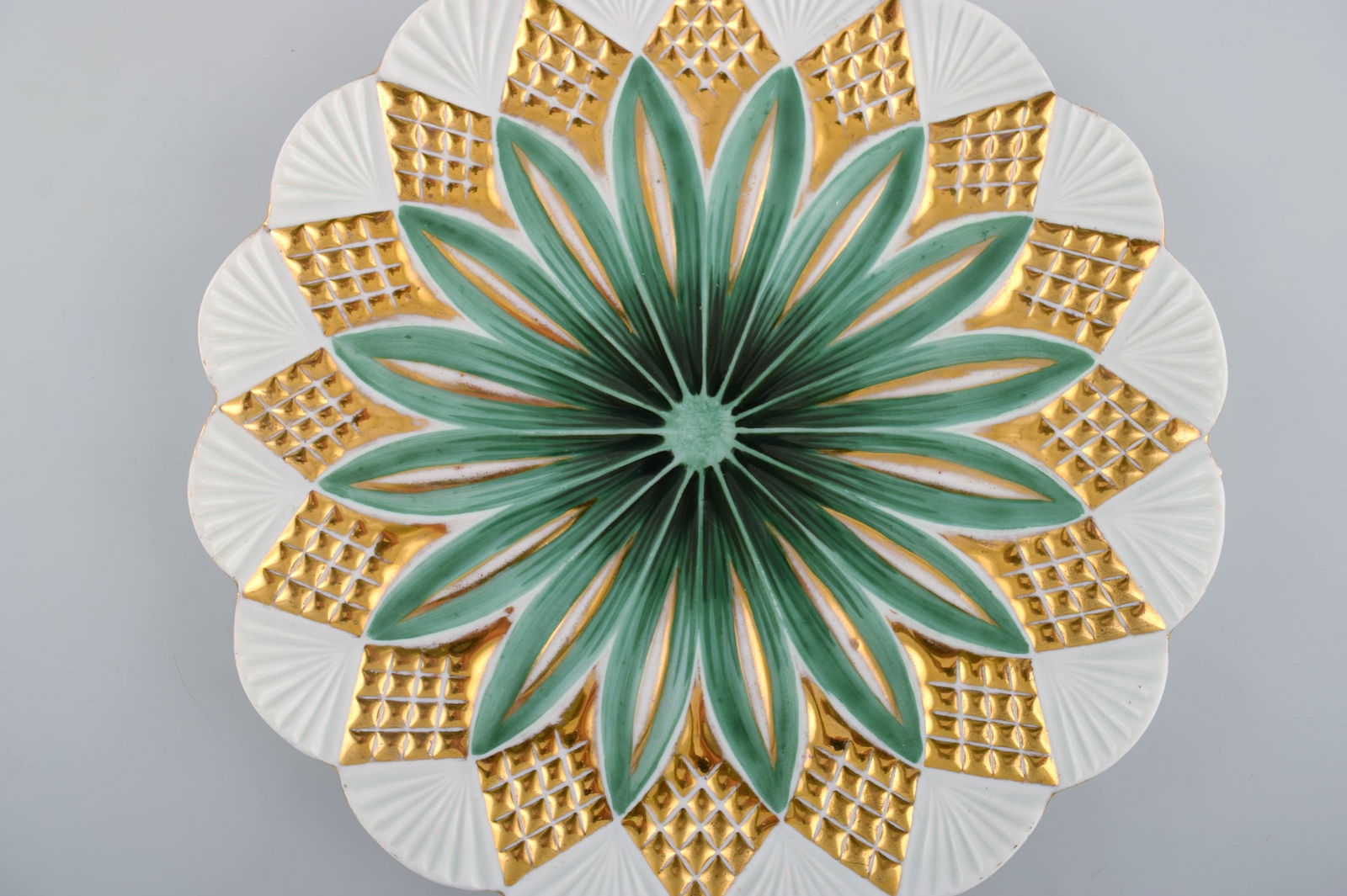 Two antique Meissen plates in hand-painted porcelain. Light green flowers and gold decoration. Early - 2