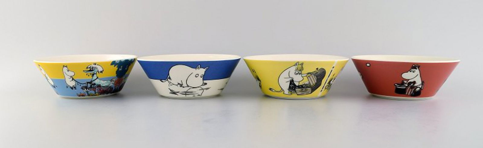 Arabia, Finland. Four porcelain bowls with motifs from "Moomin". Late 20th century. (1 of 8)