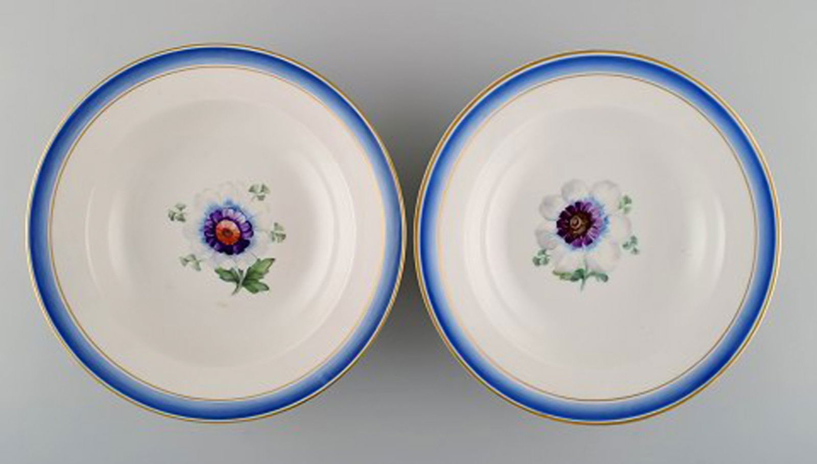 Four antique Royal Copenhagen deep plates in hand-painted porcelain with flowers and blue edge with - 3