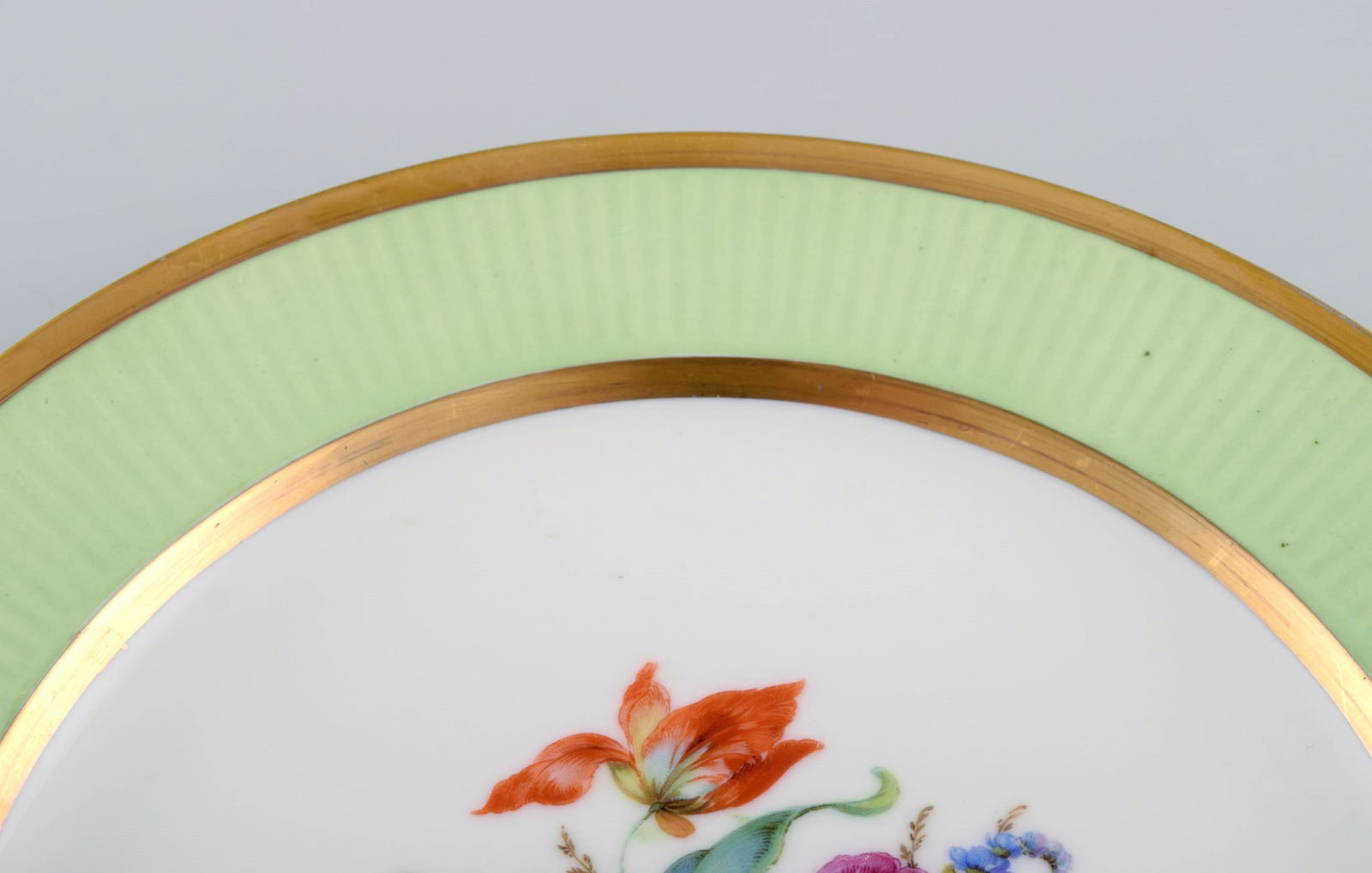 Royal Copenhagen plate in hand-painted porcelain with floral motif and edge in light green and gold. - 4
