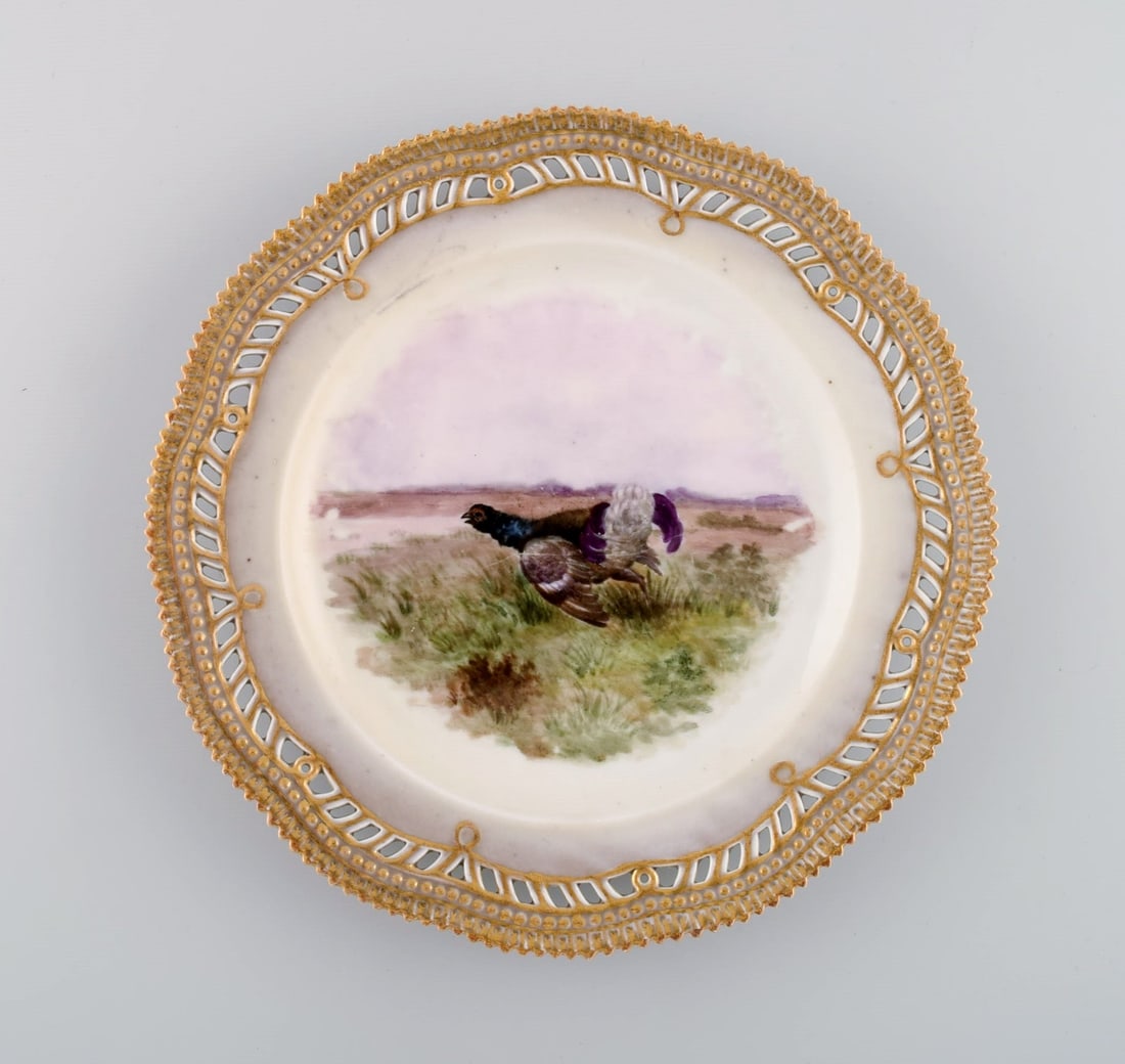 Early and rare Royal Copenhagen Fauna Danica plate in hand-painted porcelain with hunting motif and (1 of 4)