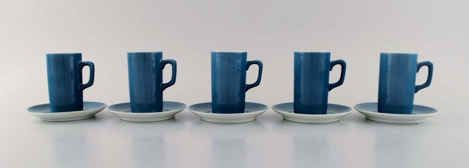 Kenji Fujita for Tackett Associates. Five coffee cups with porcelain saucers. Dated 1953-56. (1 of 5)