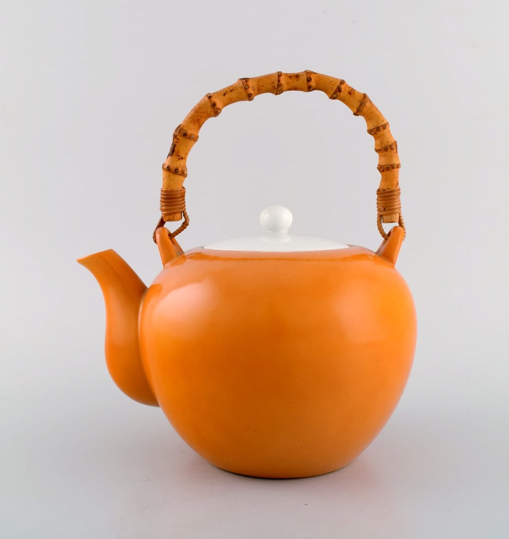 Kenji Fujita for Tackett Associates. Porcelain teapot with bamboo handle. Beautiful orange glaze. (1 of 6)