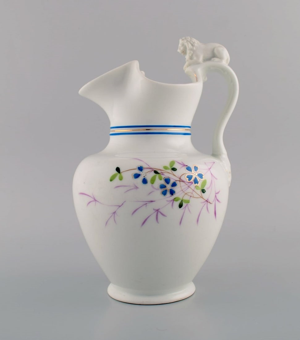 Antique Bing & Grøndahl chocolate jug in porcelain modeled with a lion on the handle. (1 of 6)