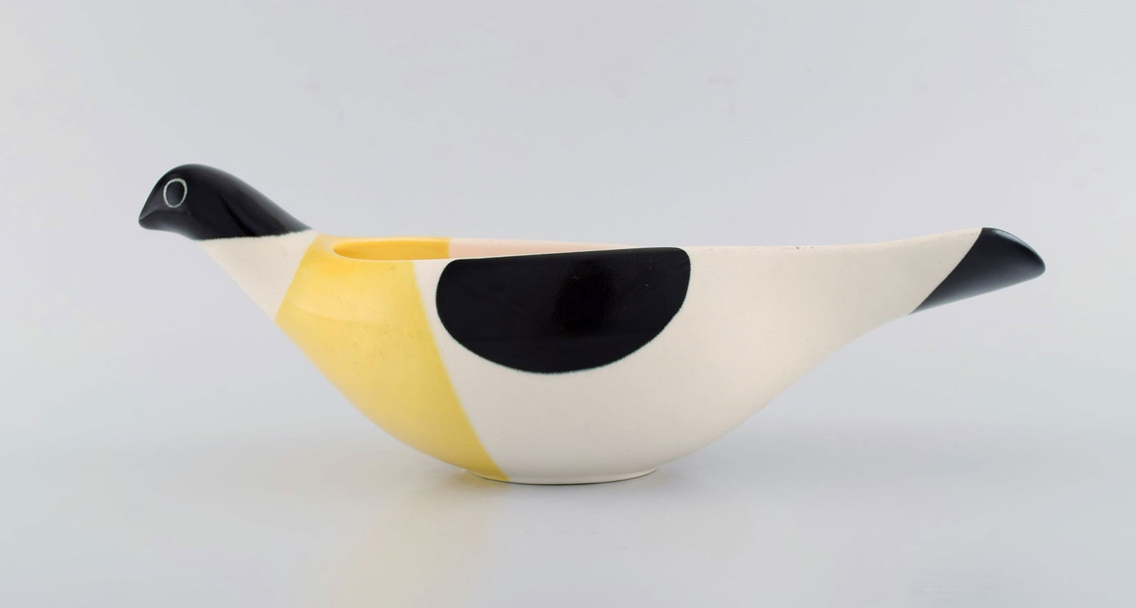 Nils Thorsson for Aluminia. Large Columbine bowl in hand-painted glazed faience. White, black and: Title: Nils Thorsson for Aluminia. Large Columbine bowl in hand-painted glazed faience. White, black and yellow bird. Model number 2749. Mid 20th century. Description: Nils Thorsson for Aluminia.