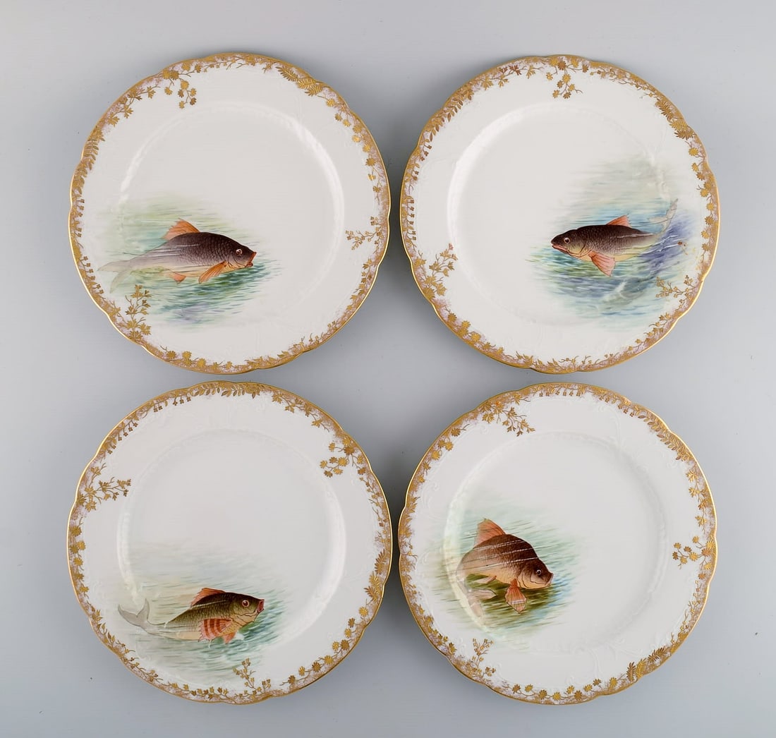 Twelve antique Pirkenhammer porcelain dinner plates with hand-painted fish and gold decoration. High - 3