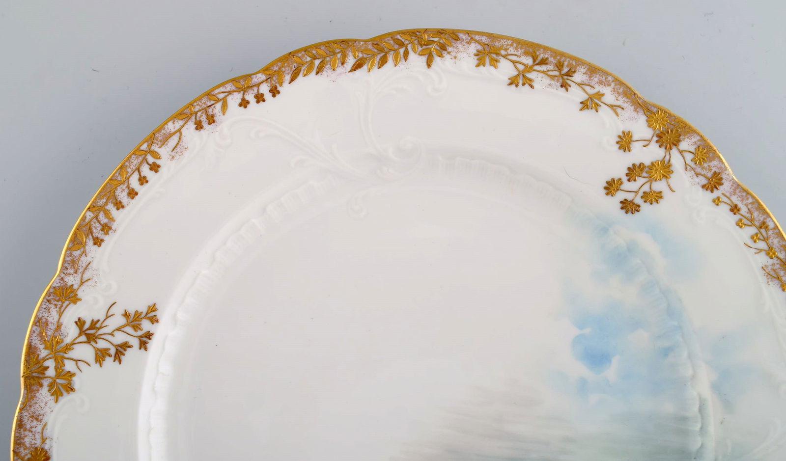 Twelve antique Pirkenhammer porcelain dinner plates with hand-painted fish and gold decoration. High - 7