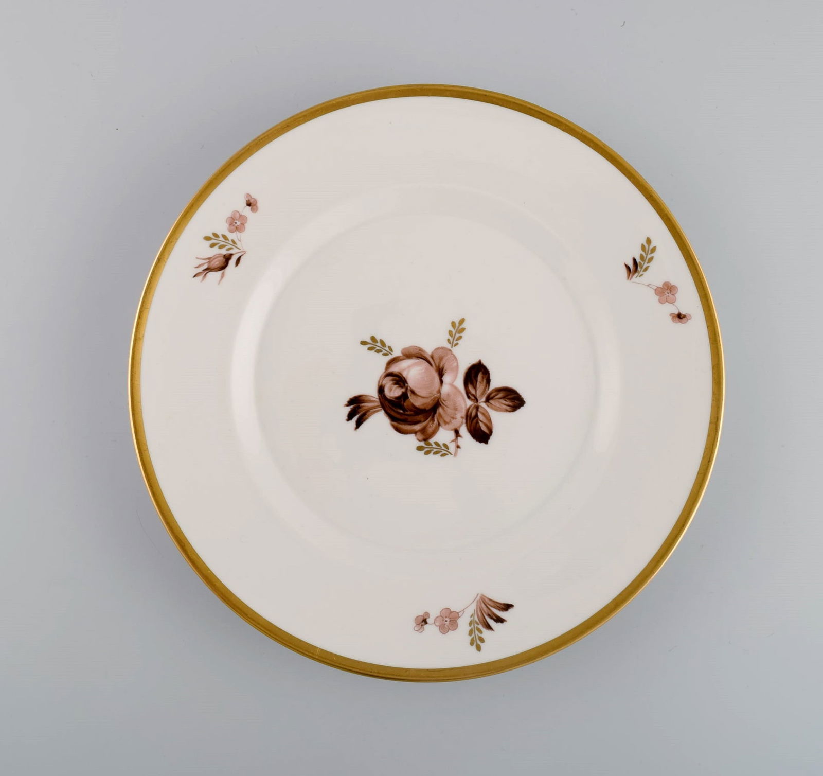 Twelve Royal Copenhagen Brown Rose plates. Model number 688/9589. 1960s. - 2