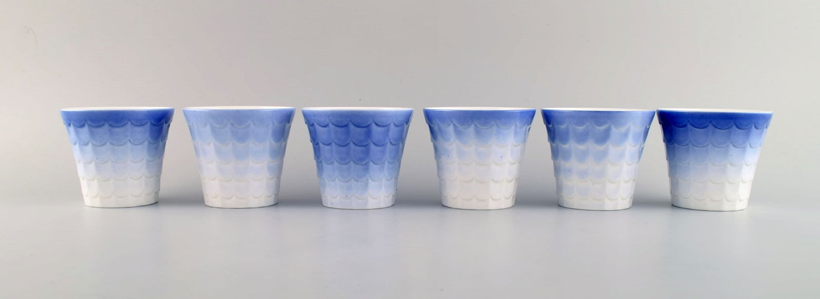Wilhelm Kåge for Gustavsberg. Six flower pot covers in porcelain. Swedish design, 1960s.: Title: Wilhelm Kåge for Gustavsberg. Six flower pot covers in porcelain. Swedish design, 1960s. Description: Wilhelm Kåge for Gustavsberg. Six flower pot covers in porcelain. Swedish design,