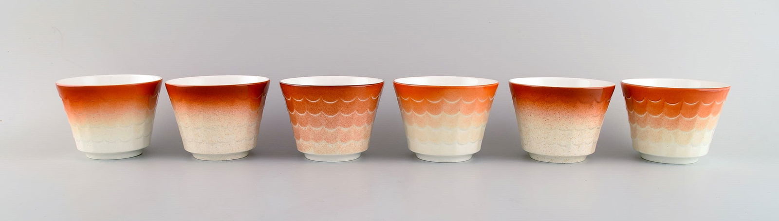 Wilhelm Kåge for Gustavsberg. Six flower pot covers in porcelain. Swedish design, 1960s. (1 of 6)