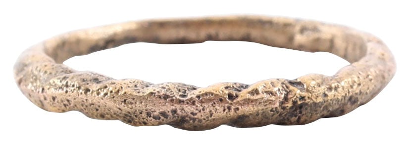 GOOD VIKING TWISTED RING C.866-1067 AD, SIZE 7 ½: Cambridgeshire, England. Where the Vikings first invaded and conquered the Anglo-Saxon natives. Size 7 1/2 with the relief, roped form over the top, and about 3/4 of its circumference. The spiral or