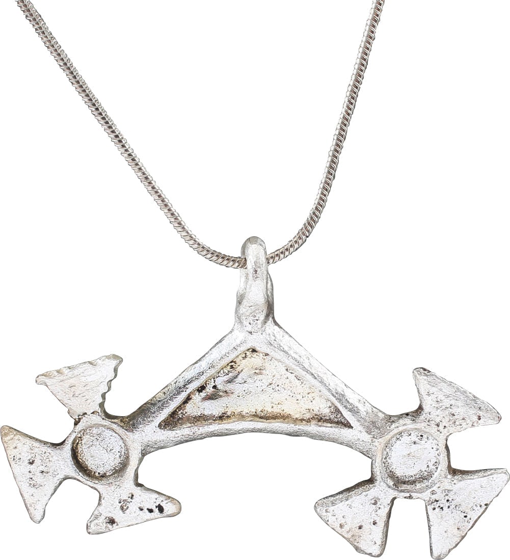 RARE VIKING LUNAR AMULET NECKLACE 950-1050 AD: Silvered bronze, just over 1 7/8” width (1.89”) of crescent form with raised edges and star burst tips with circular recess centers. The reverse flat. This form is well known and