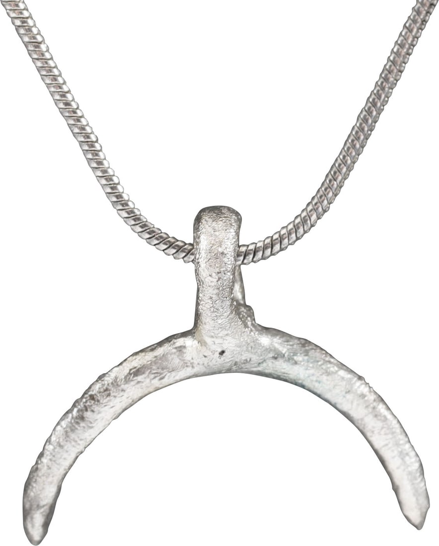 VIKING LUNAR PENDANT NECKLACE C.950-1050 AD.: Just over 7/8" (0.89”) width. As expert navigators, the constellations signified mystery and power to Vikings. The Moon was personified as Mani, brother to Sol the Sun, and is abundantly