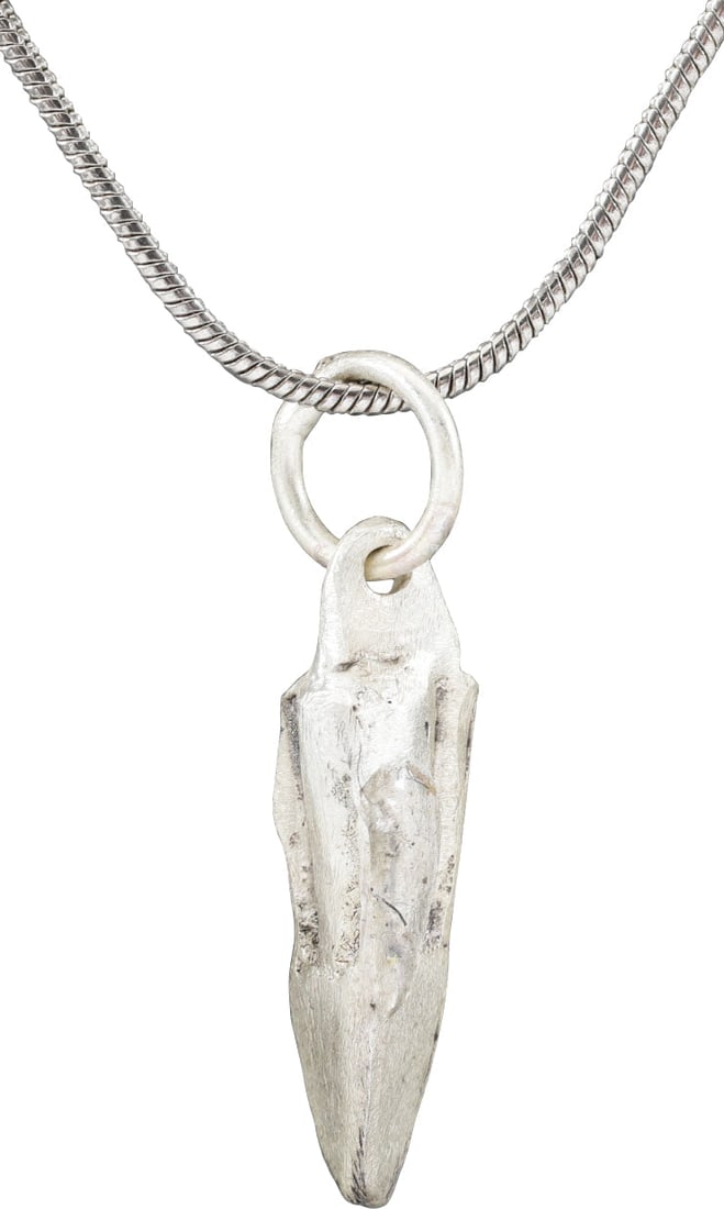 ROMAN ARROWHEAD PENDANT NECKLACE, 3rd-5th CENTURY AD.: Bronze with a slightly tapered socket with three veins transitioning to pyramidal tip. 5/8" (0.69”) length plus the suspension loop. Usually lost on the battlefield and not often found in such g