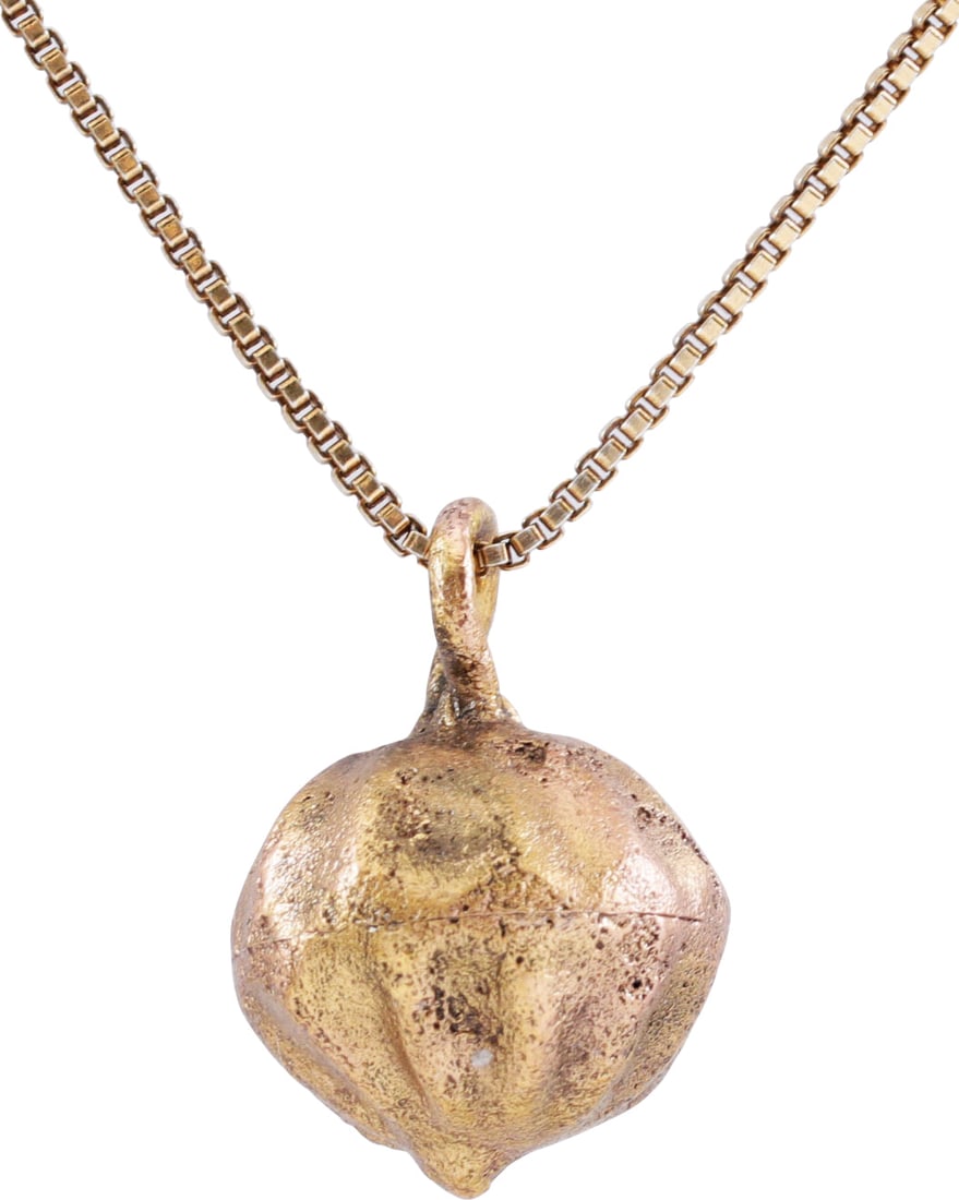 ANCIENT ROMAN SHELL OR FRUIT PENDANT C.100-400 A.D.: Gilt bronze. Just over 5/8” (0.53”) height. Ribbed spherical form, with pointed bottom. Hollow construction. Romans were very dependent on the sea and used sea motifs, real and mythical