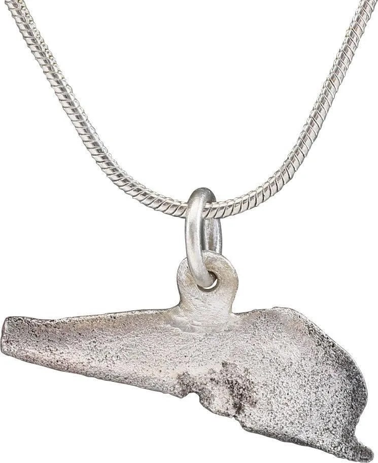 GREEK BRONZE DOLPHIN "COIN" NECKLACE, 5TH-4TH CENTURY BC: From the Greek Black Sea colony of Olbia in today's Ukraine which provided slaves, cereal, and fish. Before die struck coinage, these dolphin figures served as a means of exchange, vital for commerce