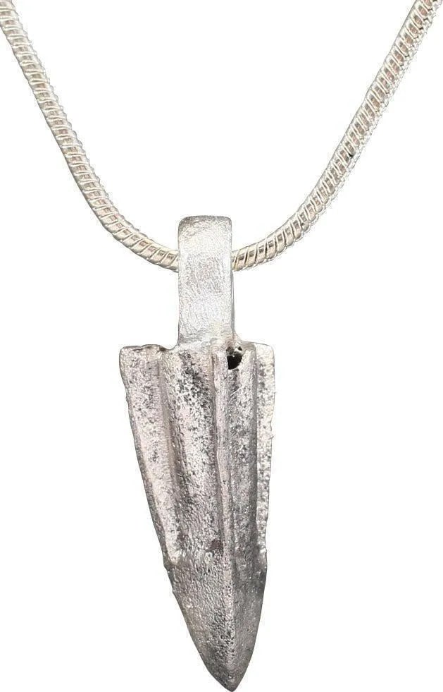 ROMAN ARROWHEAD PENDANT NECKLACE, C.100 BC: Bronze with a slightly tapered socket with three veins transitioning to pyramidal tip. 3/4" length plus the suspension loop. Usually lost on the battlefield and not often found in such good