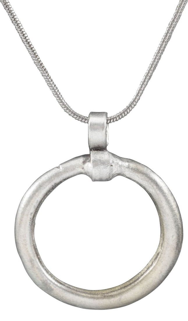 CELTIC PROSPERITY RING NECKLACE C.400-100 BC: Before the Roman invasion of the British Isles, rings of bronze, silver, and gold were used as a means of exchange, particularly in Ireland. Most exchanges of goods and property were conducted by bart