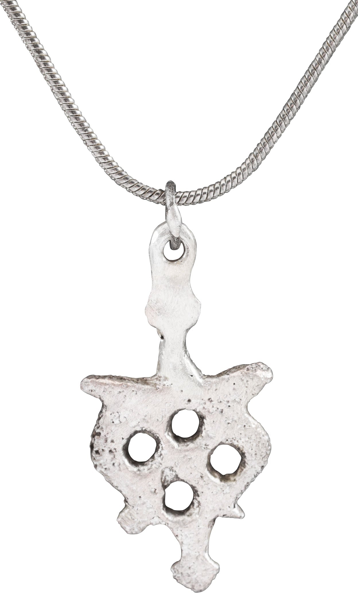 ITALIAN WOMAN’S PENDANT C.1450-1650: Silvered bronze, about 1 1/8"(1.15”) total height. Formed as an armorial device with an armorial bar. Pierced with four circles on a heart. This form is thought to derive from the Medici family