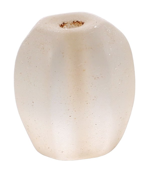 FINE VIKING CRYSTAL BEAD 850-1050 AD: Polished crystal, faceted of asymmetrical form (one end more tapered from the middle than the other) and faceted section. Just under ½” (0.47”) length and 0.38” across the