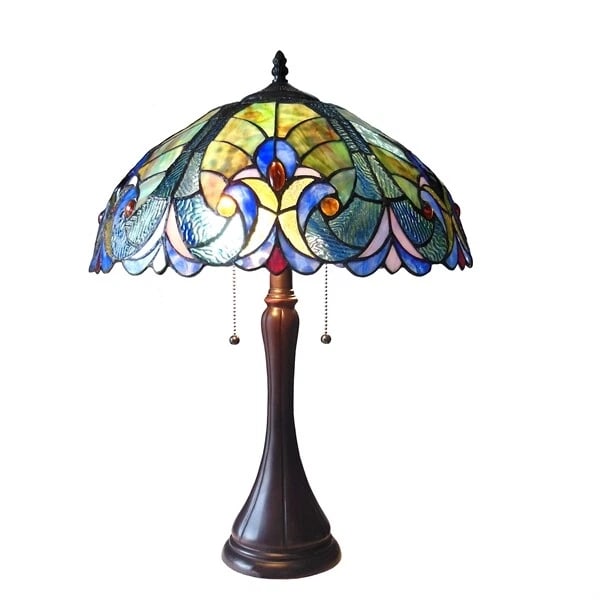 22" Stained Glass Table Lamp: 22" Tall x 16" wide Illuminate your space with the timeless beauty of our reproduction Traditional Mission-Style Table Lamp. This exquisite lamp features a hand-made stained glass shade. The