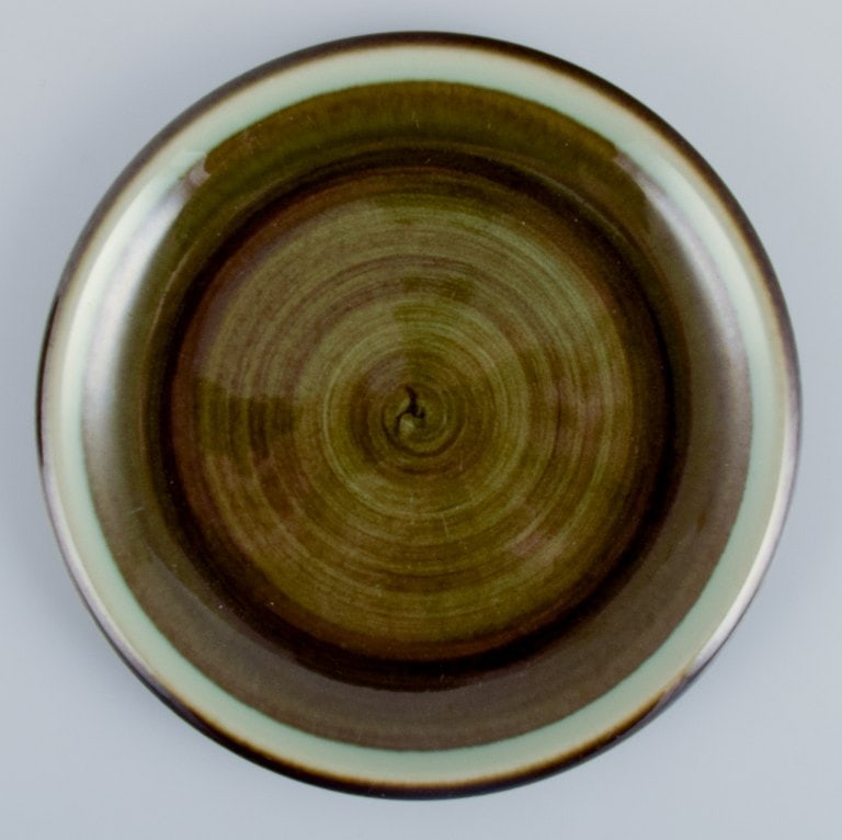 Marianne Westman for Rörstrand, "Maya", a set of ten plates with green-toned glaze. - 2