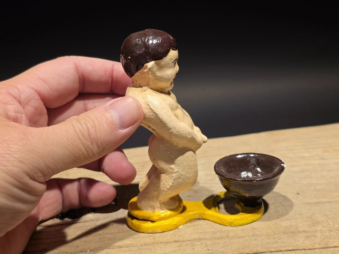 Cast Iron Folk Art Strange Bottle Opener: 4" Tall x 3" Wide Great reproduction cast iron bottle opener. This piece was made to look just like an antique, but is new. Reserve: $15.00 Shipping:Domestic: Flat-rate of $8.00 to