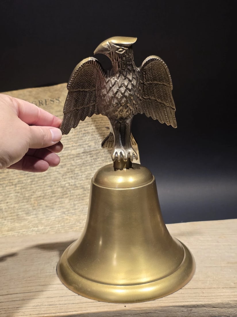 11" Brass Eagle Desk Call Bell Americana Federalist Style: Large 11" Brass Eagle Desk Bell - Federalist Style This substantial 11-inch brass bell captures the classic look of 18th and 19th-century Americana. While a modern reproduction, it is modeled after hi