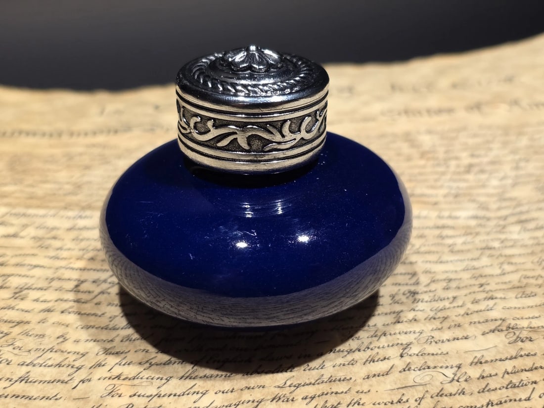 3" Cobalt Blue Ceramic Inkwell Inkpot With Silver Metal Screw Lid: A classic ceramic inkwell finished in deep cobalt blue, topped with a silver-tone metal screw cap detailed with a simple scroll pattern. Inspired by late 19th and early 20th century writing desks,