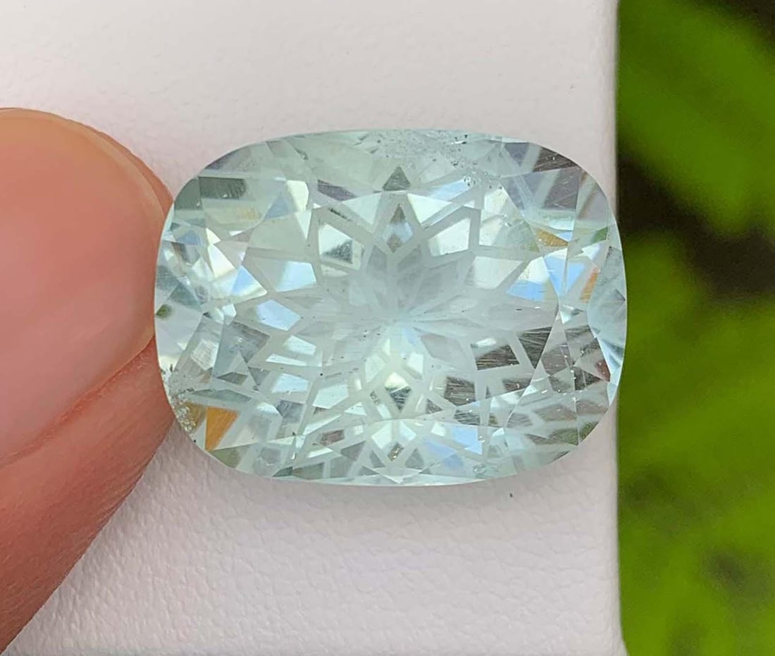 Natural Aquamarine Gemstone: 24.18 Carat Fancy Flower Cut, Pakistan Origin: Title: Natural Aquamarine Gemstone: 24.18 Carat Fancy Flower Cut, Pakistan Origin Description: Materials: Gemstone: Aquamarine Natural Aquamarine Gemstone Fancy Flower Cut, Pakistan Origin Gemology: H