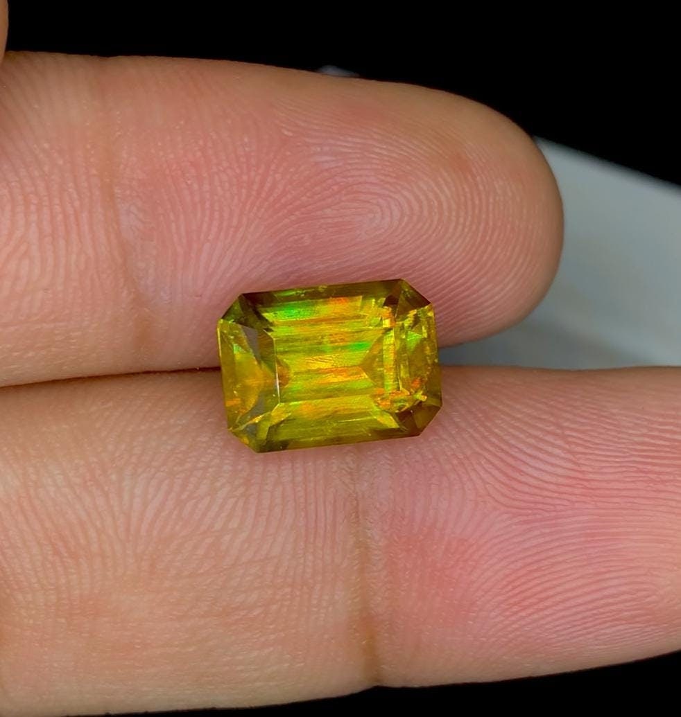 Lustrous Yellow Sphene Gemstone: Emerald Cut, June Birthstone, 6.20 Carat: Title: Lustrous Yellow Sphene Gemstone: Emerald Cut, June Birthstone, 6.20 Carat Description: Materials: Gemstone: Sphene Carat weight: 6.20 Natural Sphene Titanite Gemstone, Full Fire Lustrous Sphene