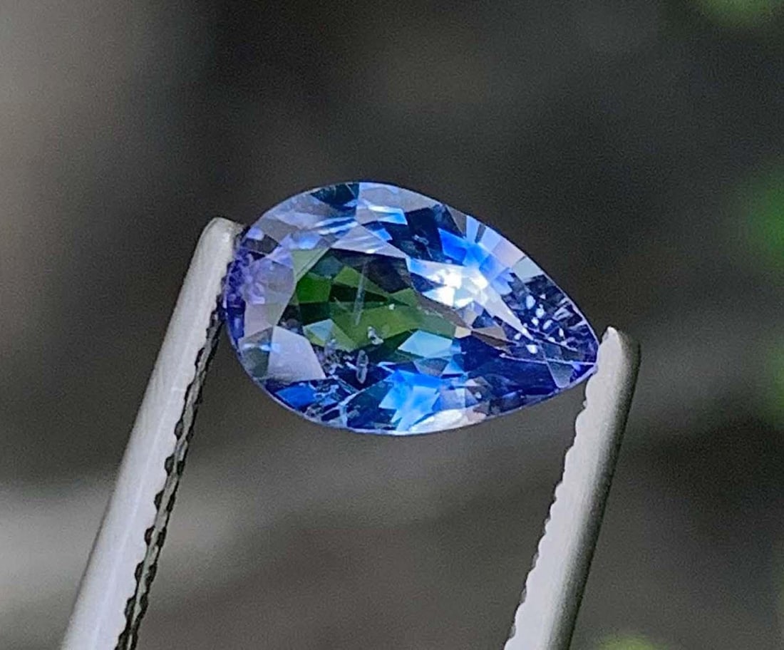 AIG Certified Faceted Blue Sapphire: 1.33 Carat Pear Cut Gemstone: Title: AIG Certified Faceted Blue Sapphire: 1.33 Carat Pear Cut Gemstone Description: Materials: Gemstone: Sapphire AIG Certified Natural Sapphire Faceted Loose Blue Color Sapphire Pear Cut For Jewell