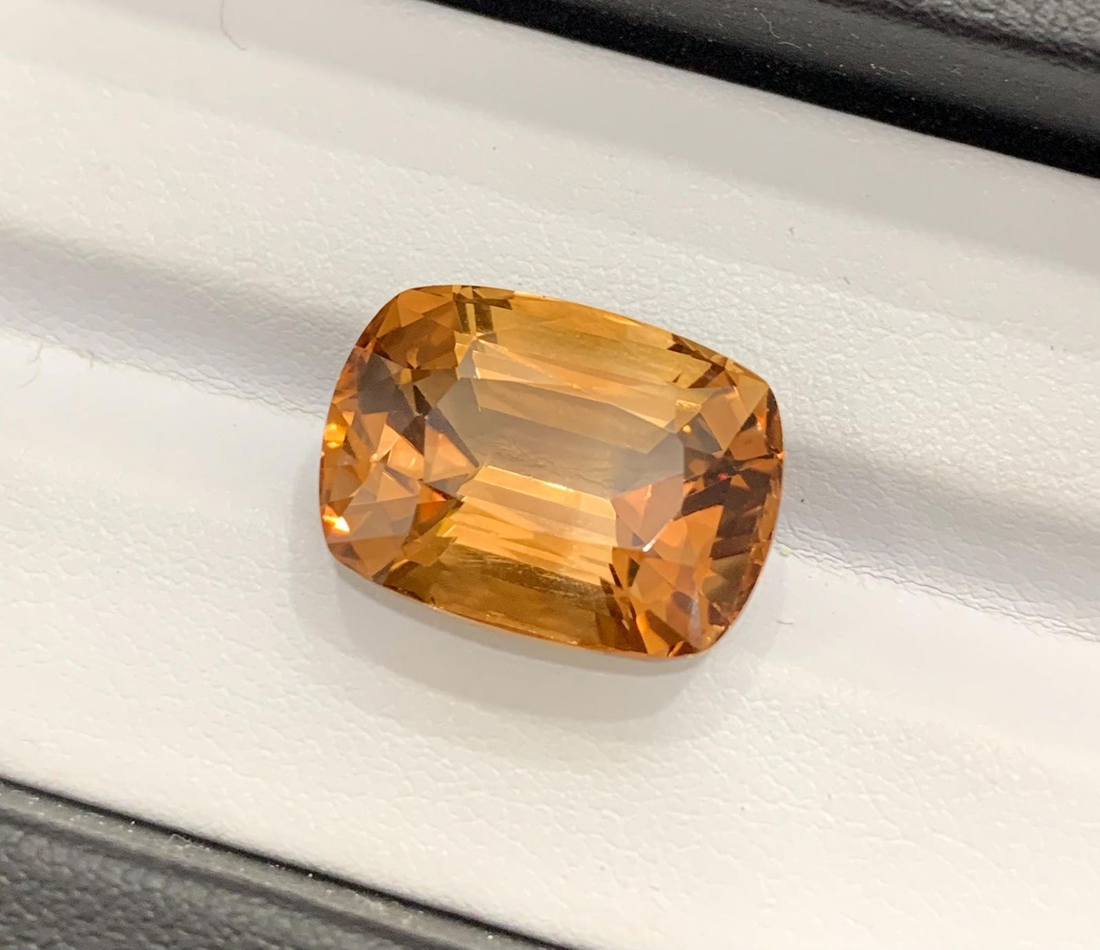 Brown Topaz Gemstone: 20 Carat Step Cushion Cut, November Birthstone: Title: Brown Topaz Gemstone: 20 Carat Step Cushion Cut, November Birthstone Description: Materials: Gemstone: Topaz Carat weight: 20 Gemology: • Weight : 20 carat • Dimension :