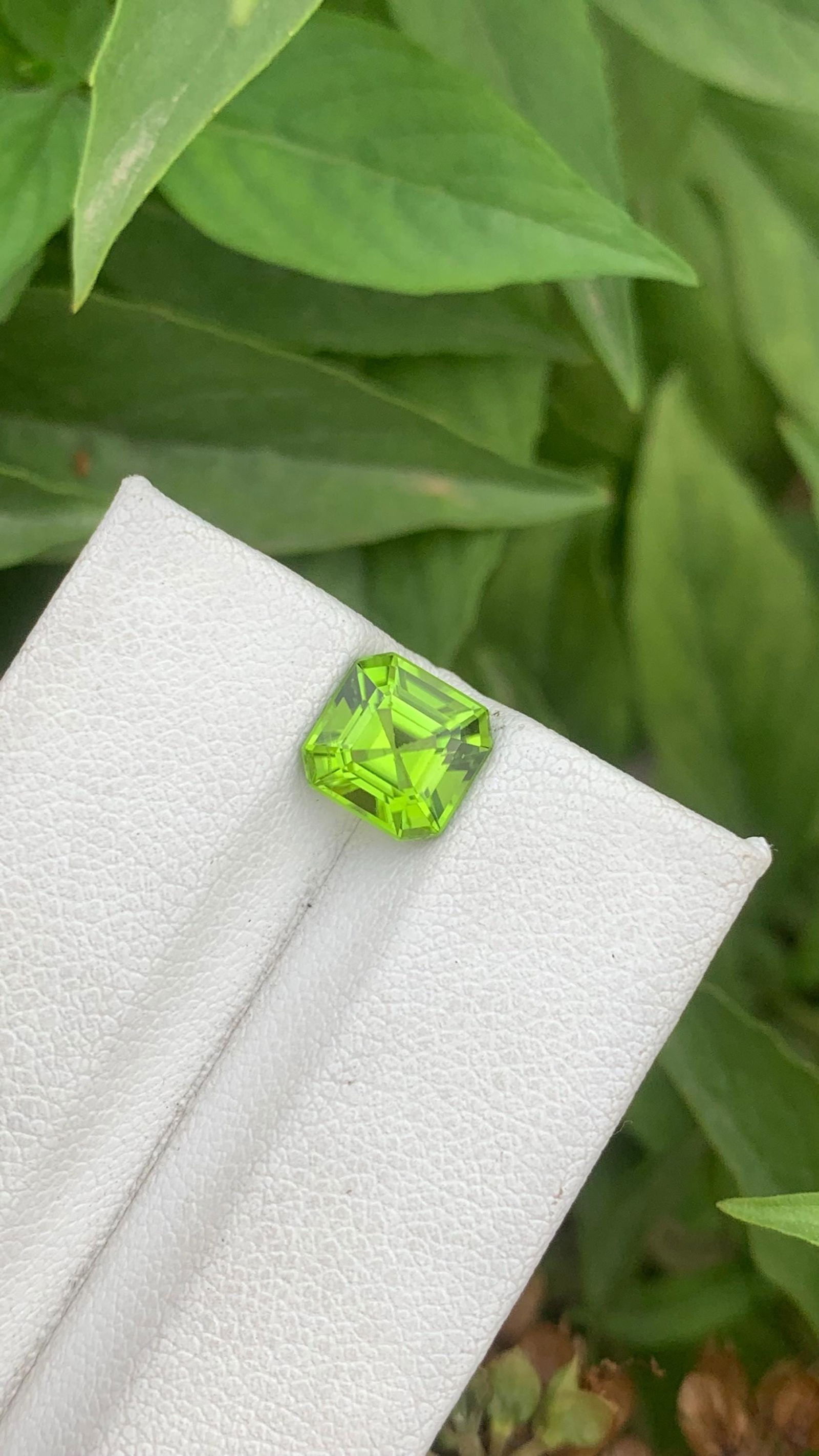 Apple Green Peridot Gemstone: 2.25 Carat Asscher Cut, Sapat Valley: Title: Apple Green Peridot Gemstone: 2.25 Carat Asscher Cut, Sapat Valley Description: Materials: Gemstone: Peridot Carat weight: 2.25 Peridot Details • Weight : 2.25 carat • Dimension : 7