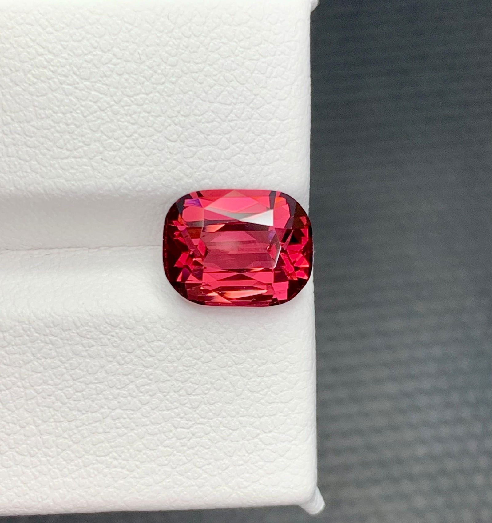 Natural Garnet Raspberry Pink Cushion Cut Gemstone From Tanzania, 3.90 Carat: Title: Natural Garnet Raspberry Pink Cushion Cut Gemstone From Tanzania, 3.90 Carat Description: Materials: Gemstone: Garnet Carat weight: 3.90 While best known for its deep, wine-red hue, garnet,