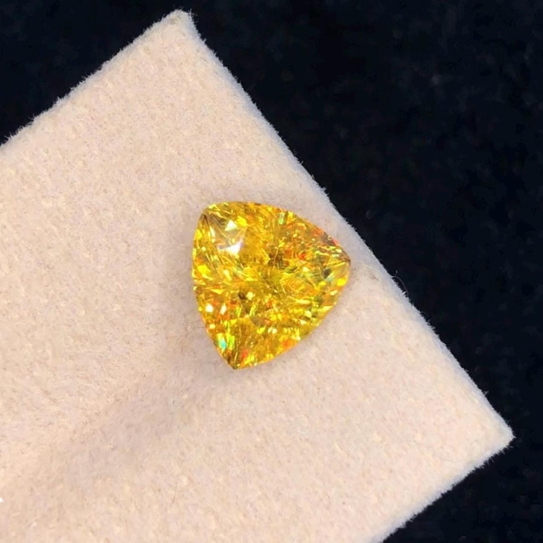 Trillion Cut Sphene Titanite Gemstone: Yellow Orange, 3.830 Ct: Title: Trillion Cut Sphene Titanite Gemstone: Yellow Orange, 3.830 Ct Description: Materials: Gemstone: Sphene Carat weight: 3.830 This stunning full fire sphene titanite loose gemstone features a