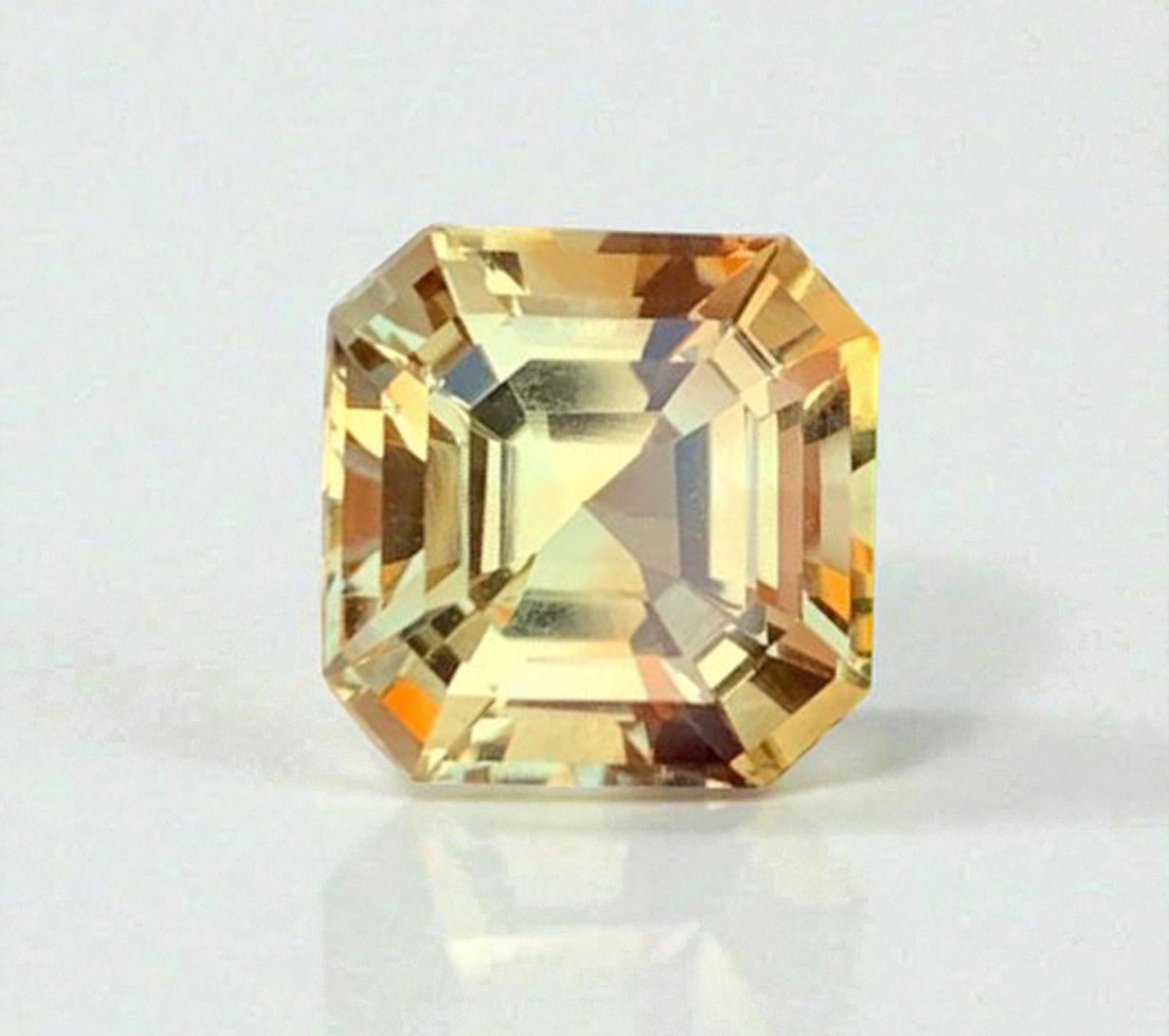Natural Heliodor Gemstone: 9.19 Carat Asscher Cut Loose Stone: Title: Natural Heliodor Gemstone: 9.19 Carat Asscher Cut Loose Stone Description: Materials: Gemstone: Heliodor Carat weight: 9.19 Natural Heliodor Gemstone, Assher Cut Heliodor Loos Gemstones