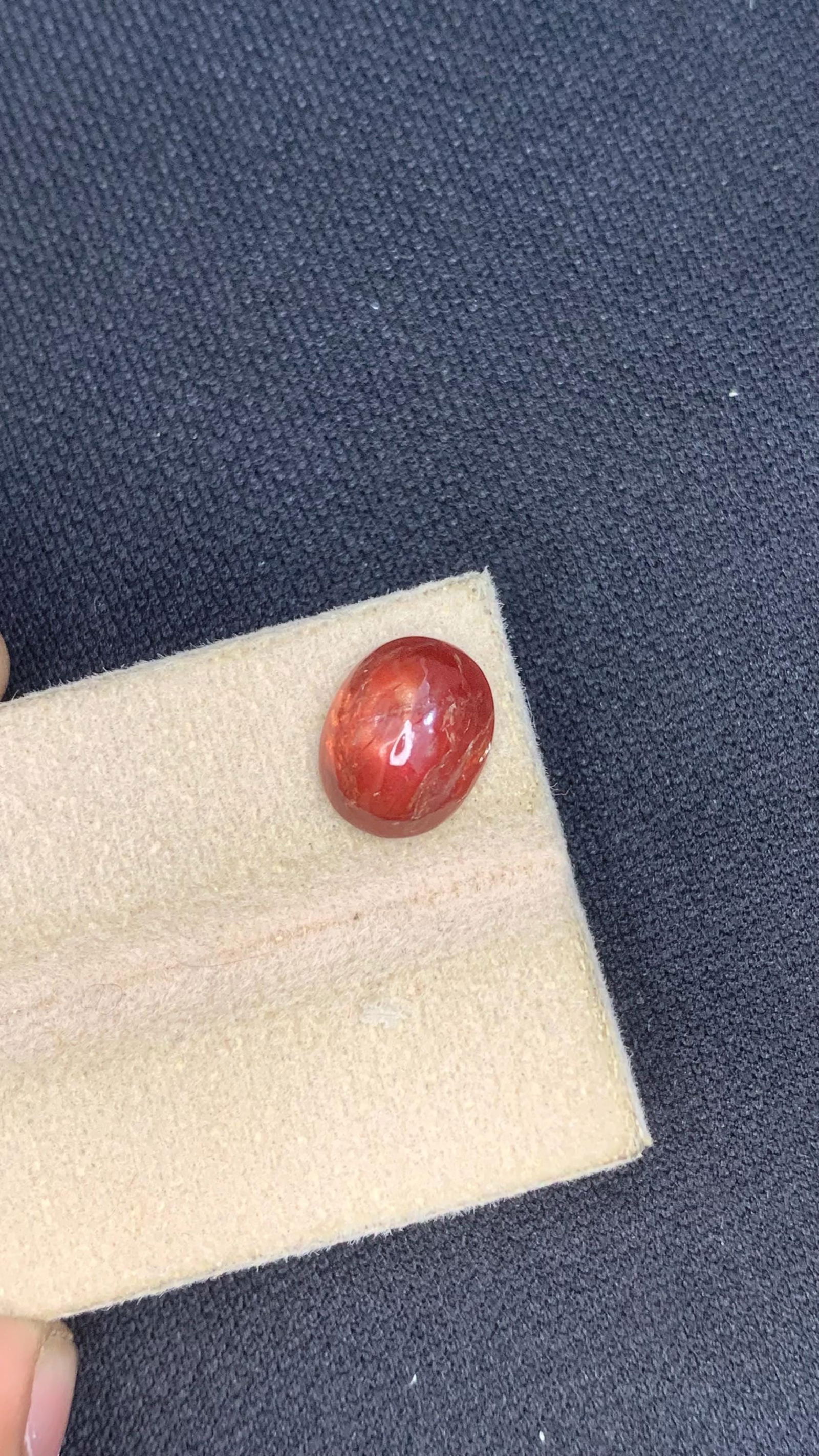 Rich Brick Red with Subtle Orange Undertones Sapphire Cabochon For Jewellery - 4.55 Carat: Title: Rich Brick Red with Subtle Orange Undertones Sapphire Cabochon For Jewellery - 4.55 Carat Description: Materials: Gemstone: Sapphire Carat weight: 4.55 The sapphire cab has been skilfully cut w