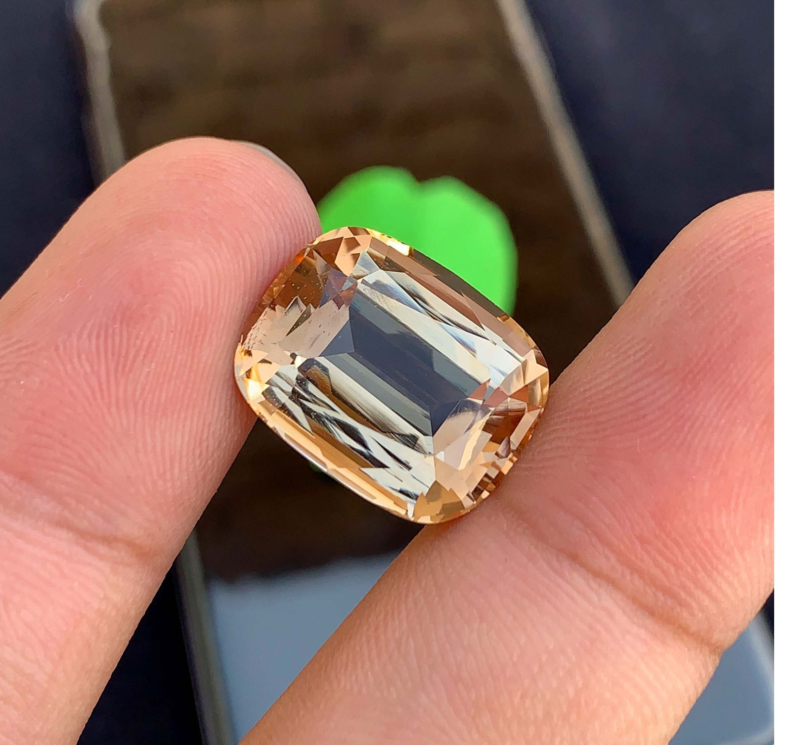 Natural Golden Imperial Topaz Gemstone: 23.50 Carat Cushion Cut: Title: Natural Golden Imperial Topaz Gemstone: 23.50 Carat Cushion Cut Description: Materials: Gemstone: Topaz Carat weight: 23.50 Natural Imperial Topaz Gemstone, Golden Color Faceted Cushion Cut For
