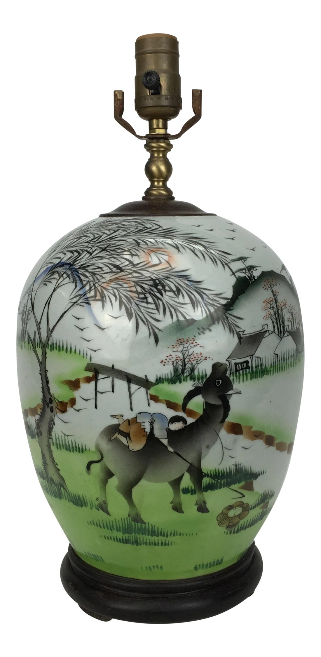20th Century Chinese Pasture Scene Painted Porcelain Lamp: Scene on the lamp shows a young farm boy sitting on his cow working on their farm. Trees sway with the wind in the background and the overall colors used give off a fresh feeling with liveliness. 