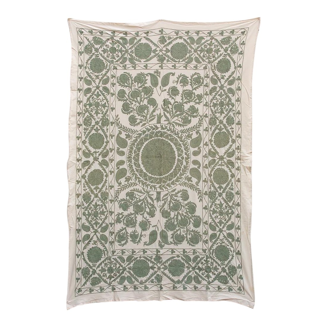 Sage Paisley Hand-Embroidered Suzani Throw: This beautifully restrained textile is an authentic Suzani (suzan means "needle"), hand-stitched in Central Asia, where it formed a vital part of a bride's wedding dowry. It is particularly valued