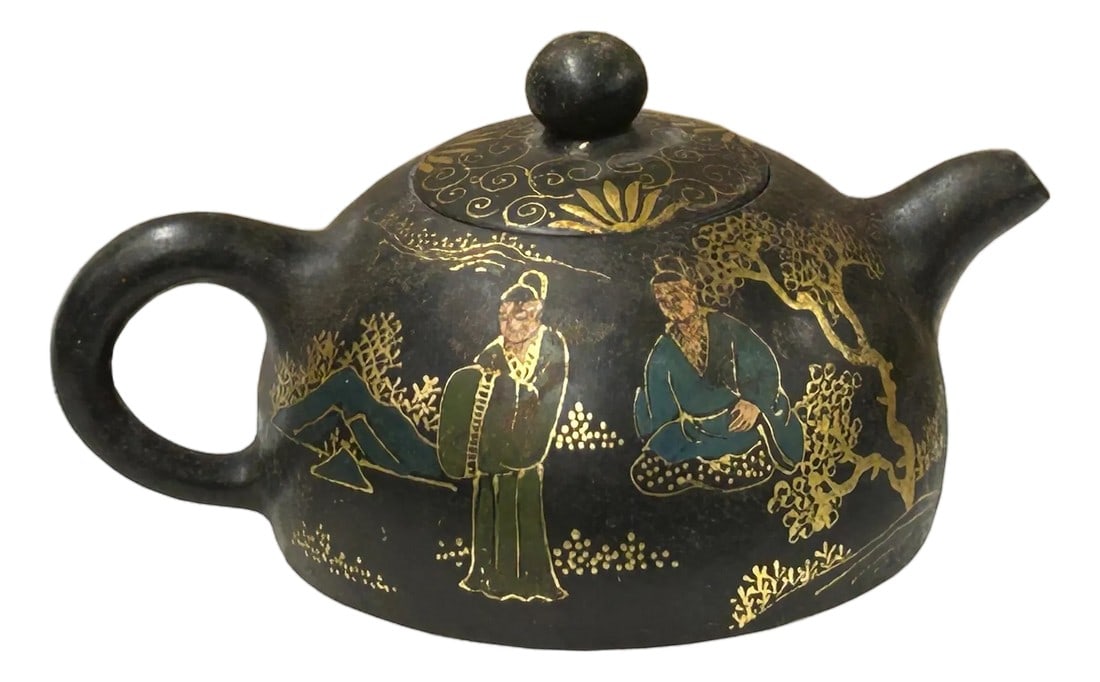 Vintage Chinese Black Golden Graphic Zisha Clay Teapot Art Display: This appears to be a vintage or antique dark-clay teapot, likely of Chinese origin, characterized by its rounded, squat body and rich, textured black surface. The teapot is adorned with vibrant