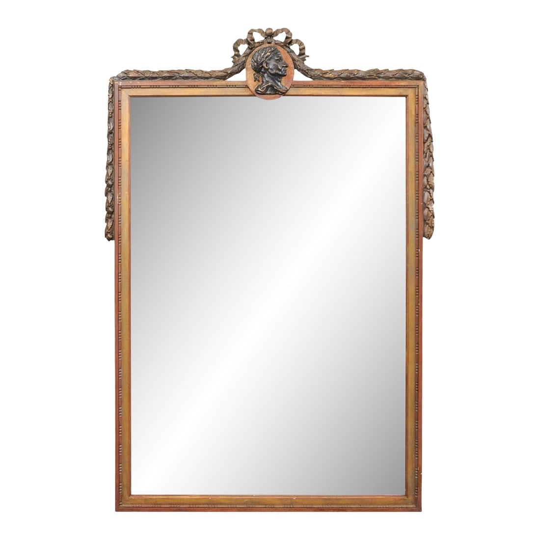 Mid 20th Century Niermann Weeks Neoclassical Style Mirror: This vintage mirror, by American creator/manufacturer Niermann Weeks, has been designed in a Swedish Neoclassical style. The mirror features a profile bust of Caesar within the top crest center, adorn