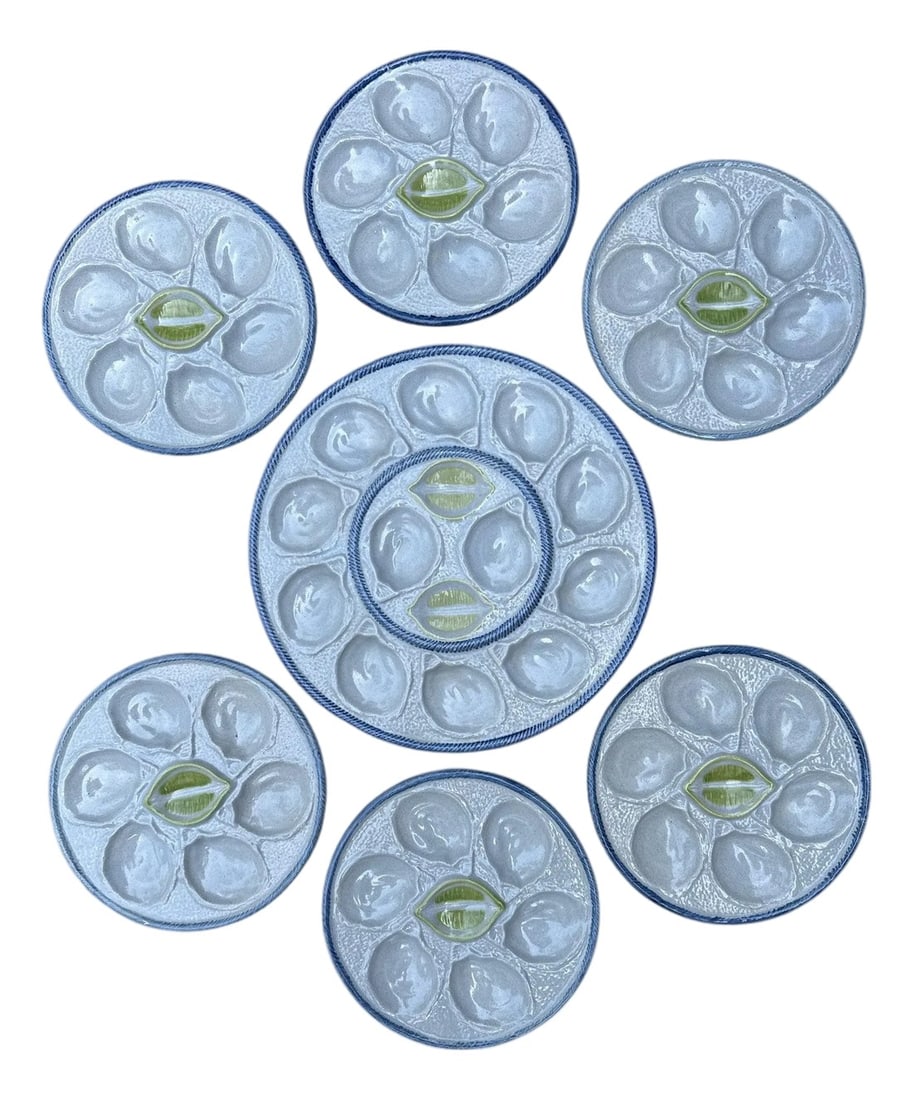 French Oyster Plates and Platter: Set of 1950's set of six oyster plates and one platter by St Clement. plate 10" dia, platter 15"dia 49-062 Condition: Alterations: Original Condition Unaltered Imperfections: Some Imperfections Condit