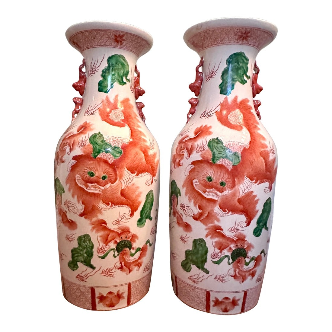 Vintage 24" Hand Painted Chinese Porcelain Jars With Foo Dogs and Inscriptions, a Pair: Vintage Chinese Porcelain Vase With Foo Dog Motif, a Pair. Marked on bottom. Circa 20th century. Painted in iron red, these Foo Dogs or Imperial Guardian Lions are strong Feng Shui protection symbols