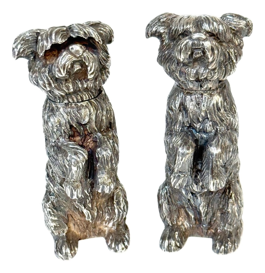 Pair Edwardian Sterling Terrier Salt & Pepper London, Jonathan Howell, 1906/1913: Pair of Edwardian Sterling Terrier Pepper Pots, London, Jonathan Howell, 1906/1913 This whimsical pair of novelty sterling silver shakers, modeled as seated terriers in a "begging" pose, exemplifies