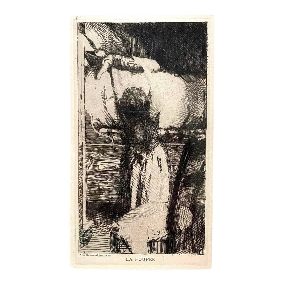 19th Century Etching "The Doll" by Paul-Albert Besnard (France) - Framed/Matted: Etching by French artist Paul Albert Besnard (1849–1934) titled "The Doll" (La Poupée). The work was created in 1888. It depicts a small girl, seen from behind, lifting a doll onto a bed.