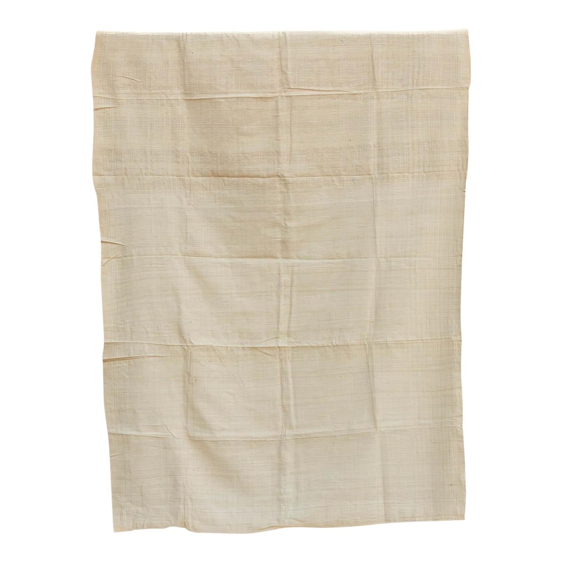 Organic Peace Silk Throw, Pale Birch: The purest expression of the material itself. These throws are crafted from Undyed or Lightly Tinted Eri Silk, celebrating the raw, organic beauty of the fiber. Without heavy dyes to mask it, the hand