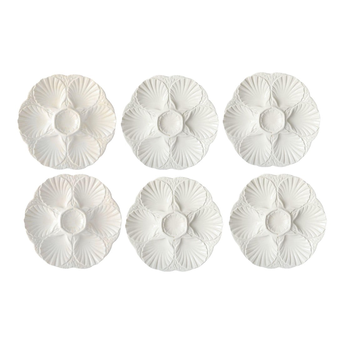 1960s Sarreguemines French Oyster Platers, Set of Six: This 1960s set of six French oyster plates by Sarreguemines feels straight out of a long lunch on the coast"”linen tablecloth, chilled Muscadet, oysters disappearing faster than planned. Each