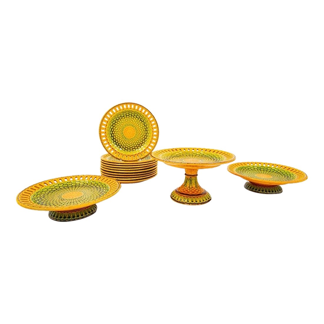 Antique 19th Century English Majolica Basketweave Dessert Service by Wittman & Roth, London: From an estate in Chicago, this incredible richly glazed 19th century English Majolica Basketweave Dessert Service by Wittman & Roth, London, comprises 10 dessert plates, and 3 pedestal cake stands. 